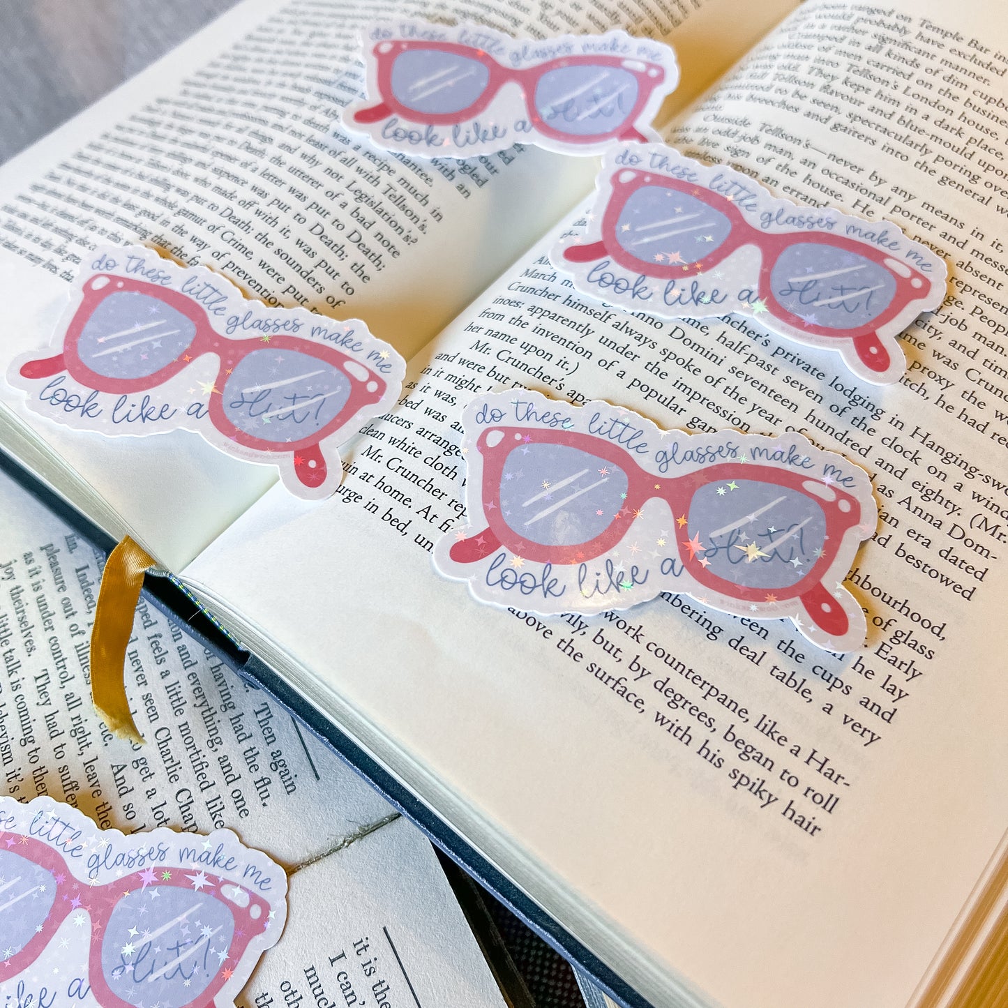 Sunglasses-themed bookmarks on an open book