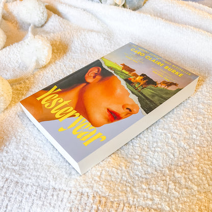 Book titled 'Yesteryear' by Caro Claire Burke on a textured surface