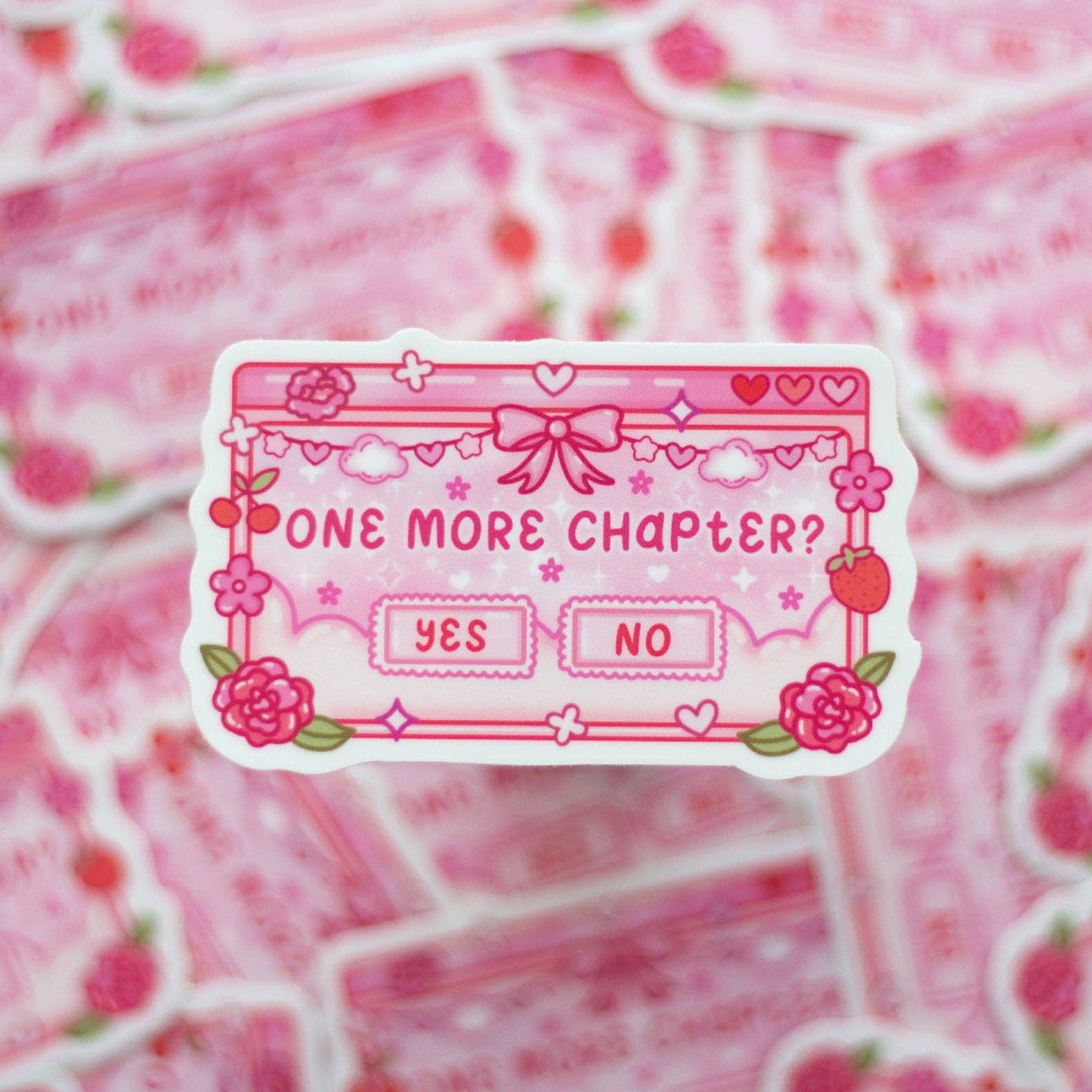 Pink sticker with 'One more chapter?' question and 'Yes'/'No' options on a pink background