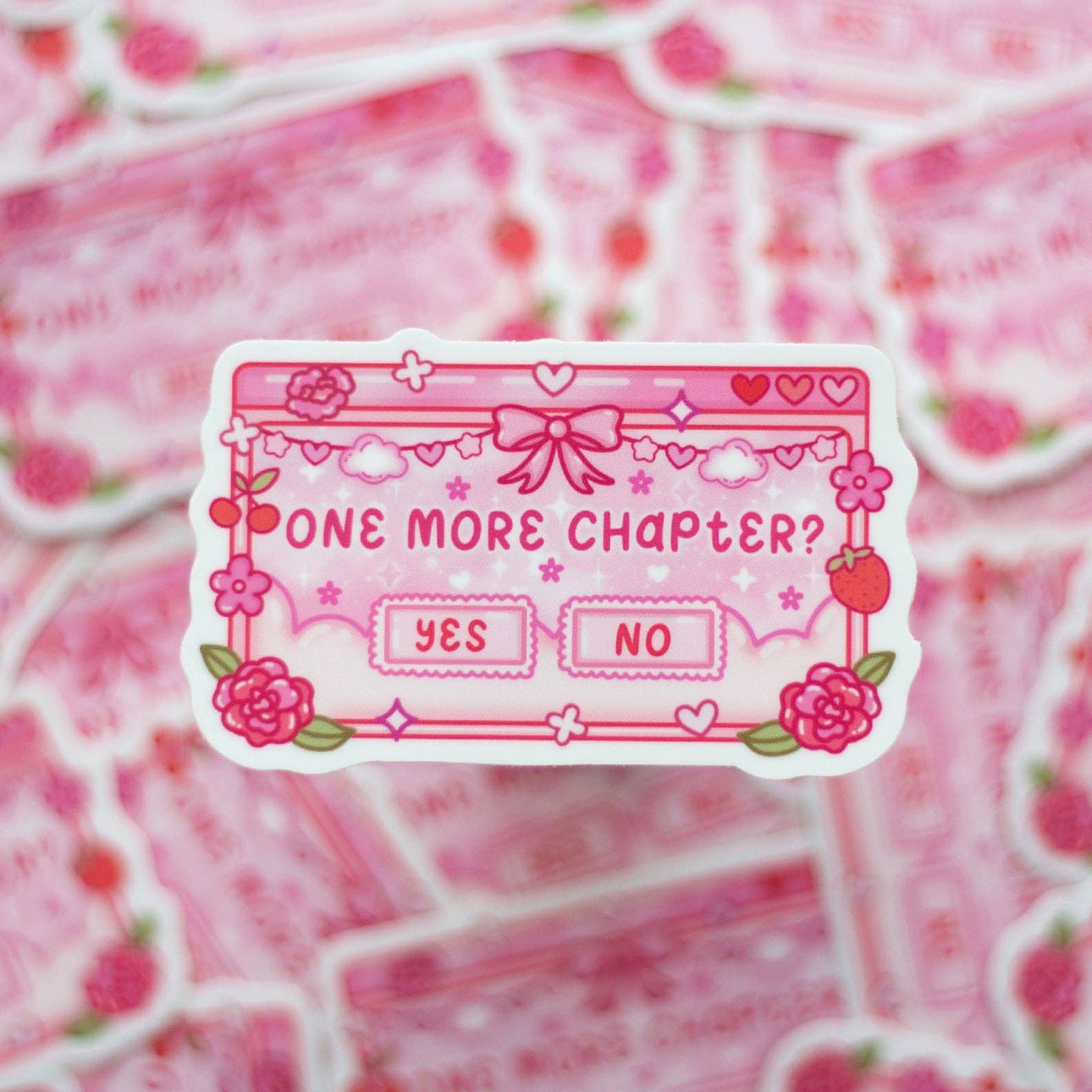 Pink sticker with 'One more chapter?' question and 'Yes'/'No' options on a pink background