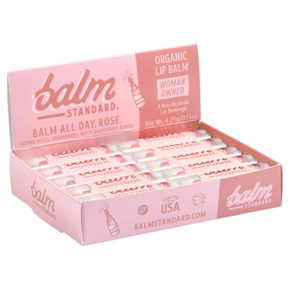 Box of 'The Balm' lip balm with pink packaging on a white background