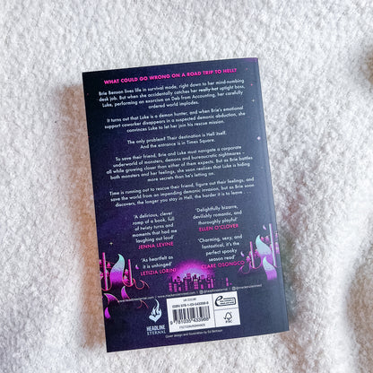 The back cover of the book, displayed flat on a white textured fabric background.