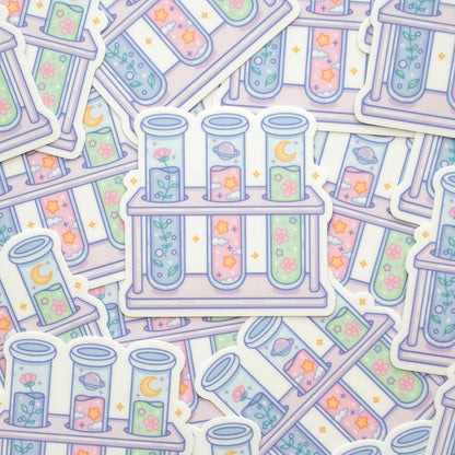 Pattern of test tubes and test tube racks with colorful liquids and flowers on a light background.