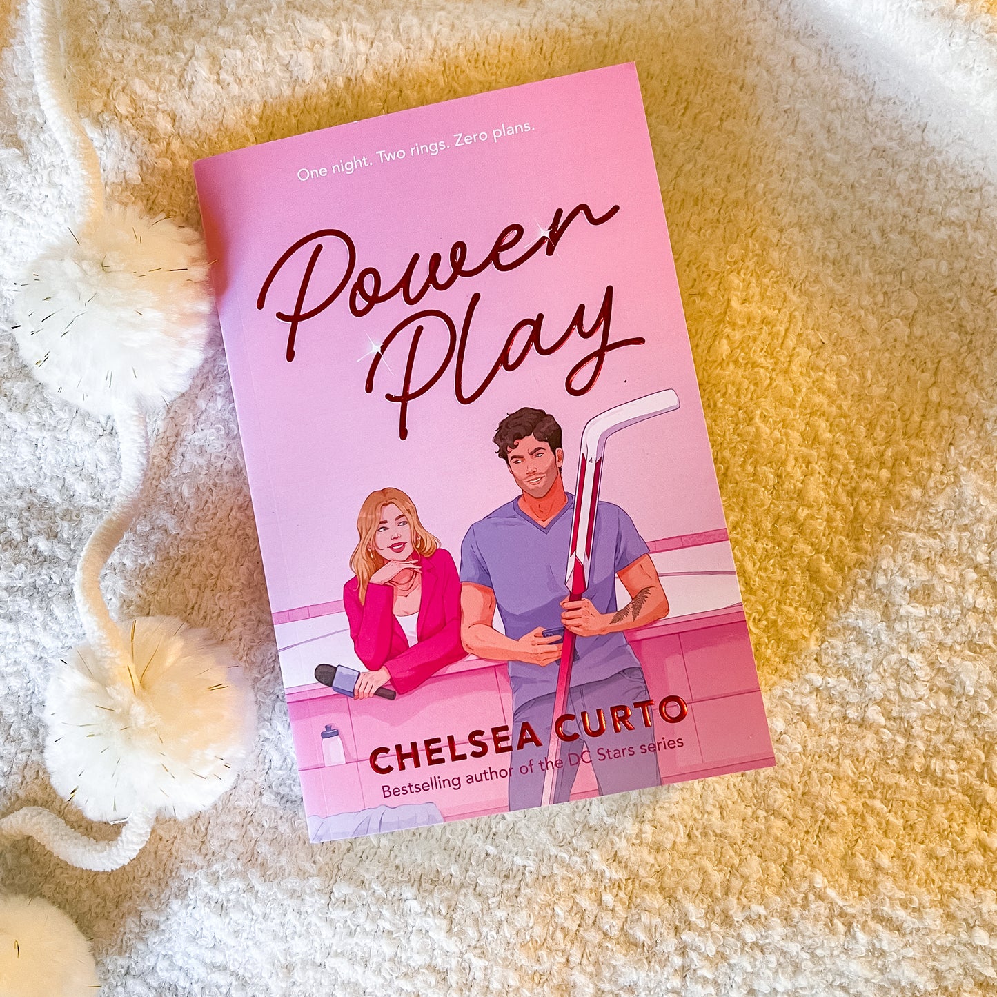 Book titled 'Power Play' by Chelsea Curto on a textured surface