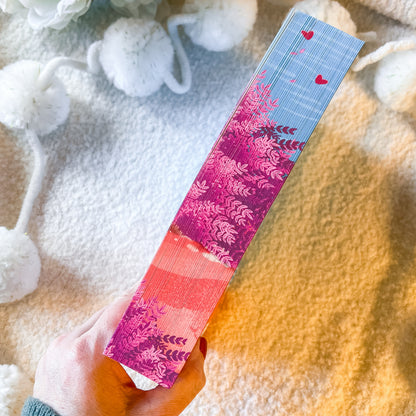 The sprayed edges of the book "rules for the summer" on a textured white background.