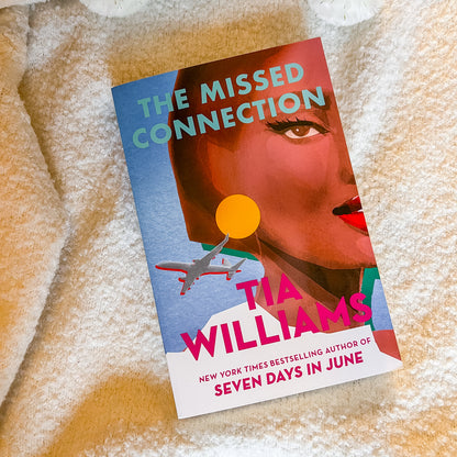 Book cover of 'The Missed Connection' by Tia Williams on a textured surface