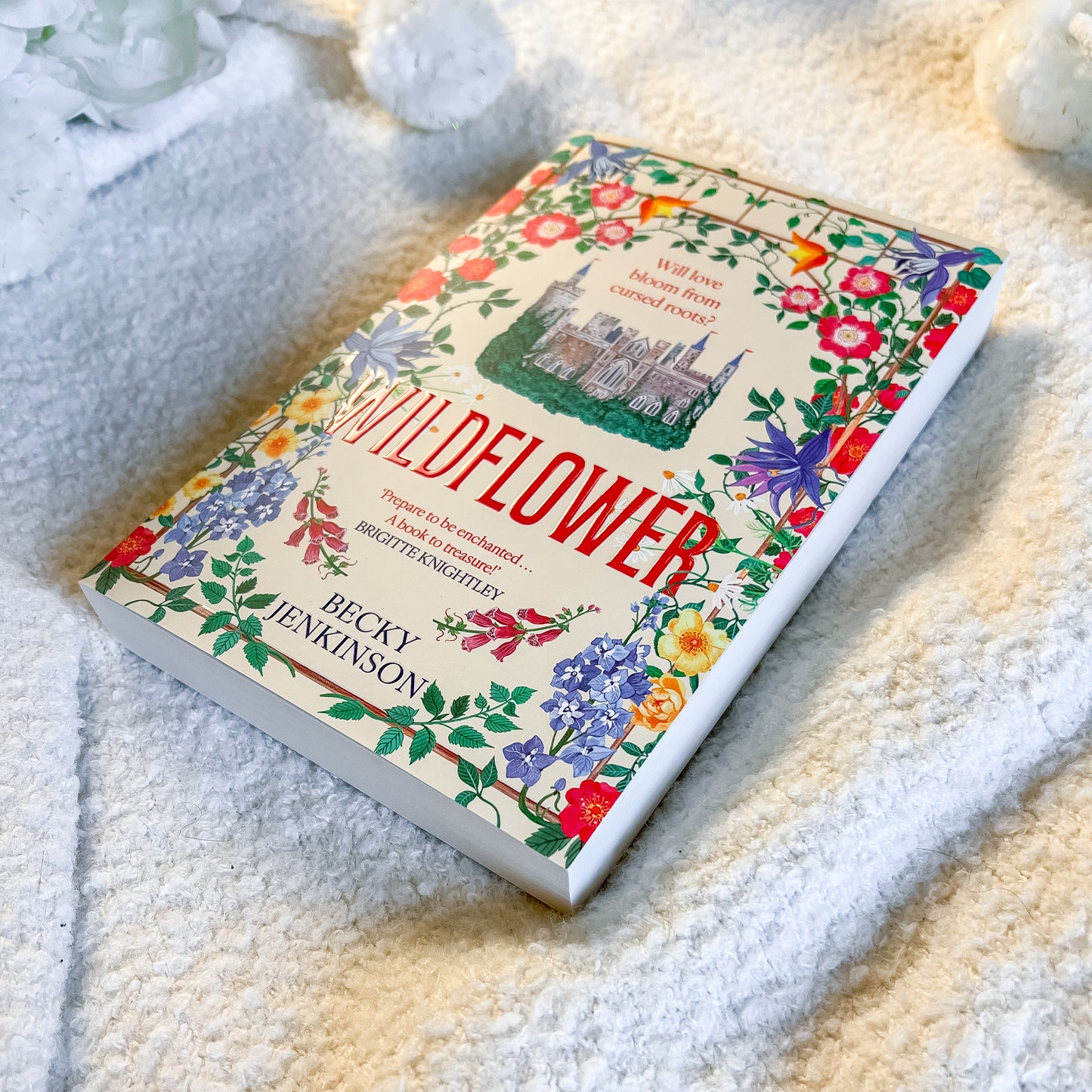 Book titled 'Wildflower' by Becky Henkenson on a textured white surface
