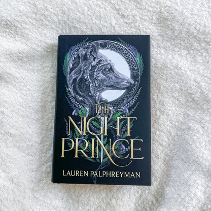 Book titled 'The Night Prince' by Lauren Palphreyman on a textured white surface