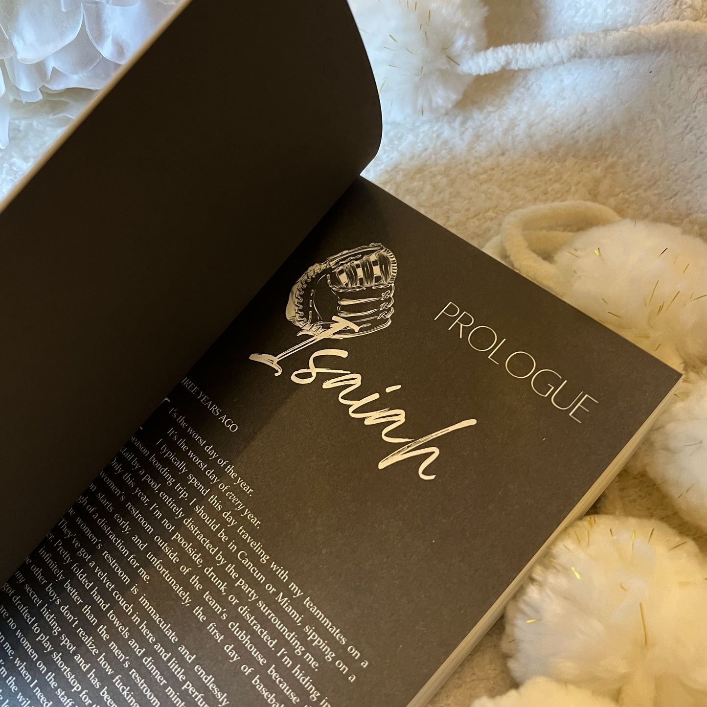 interior of play along by liz tomforde showing black pages