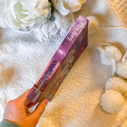 spine of play along by liz tomforde on a pale background