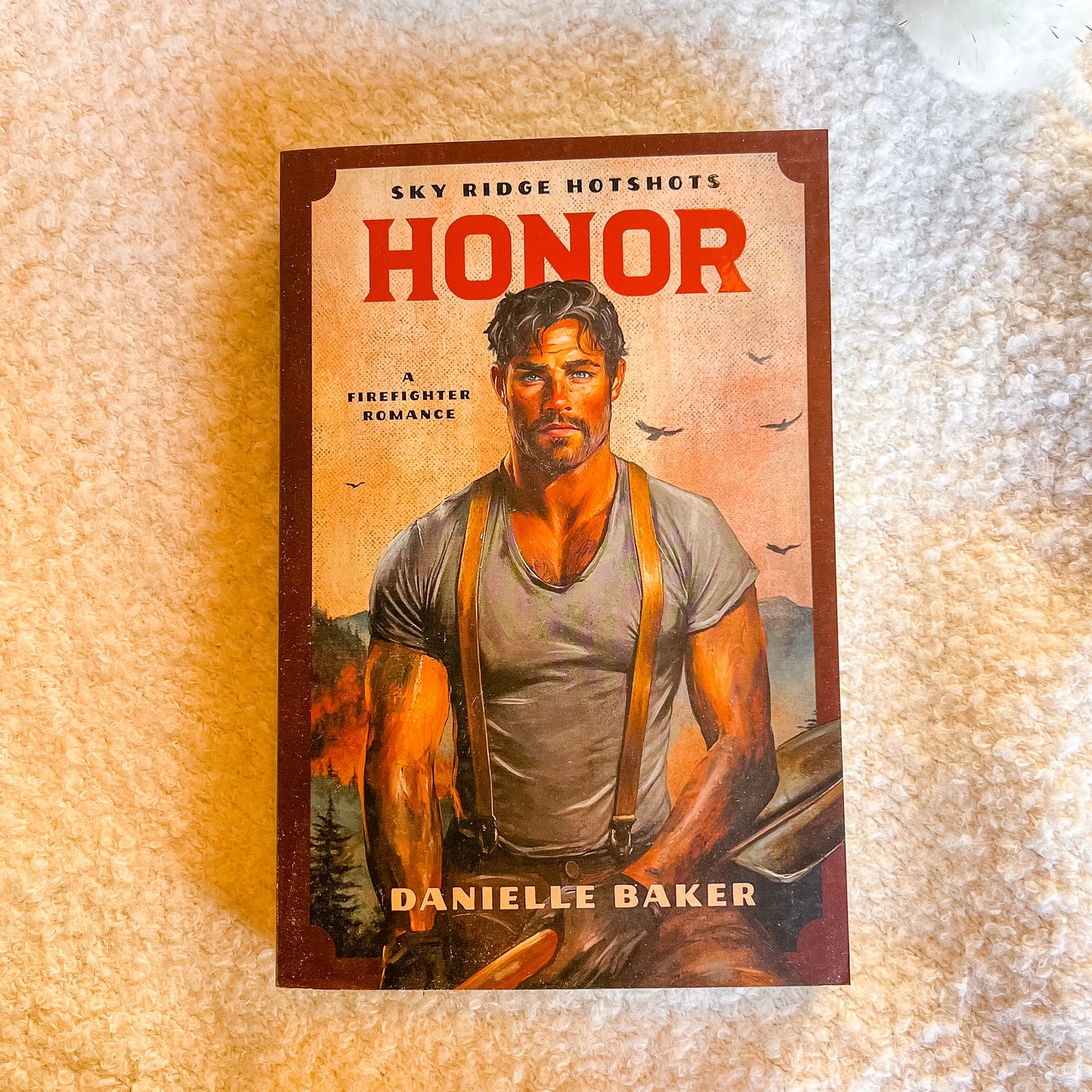 Book cover of 'Honor' by Danielle Baker on a textured surface