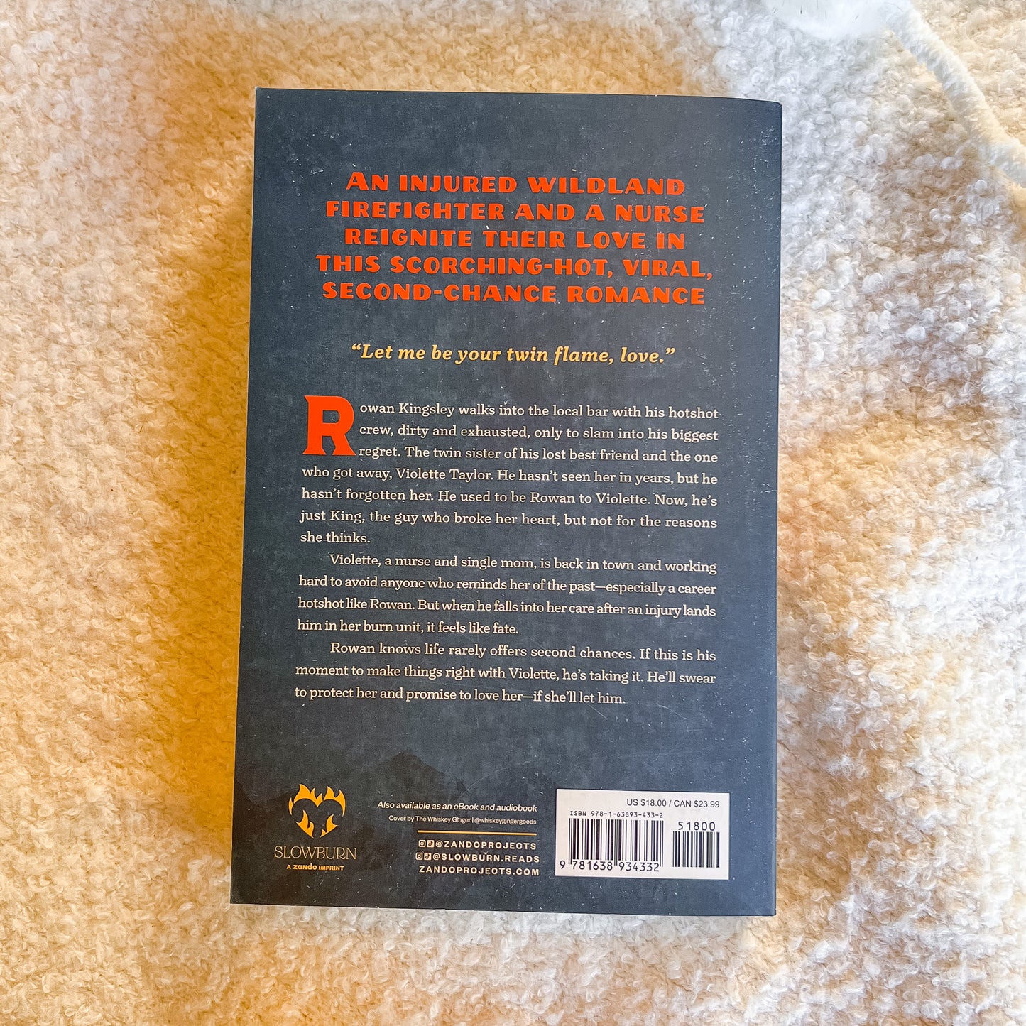 Book cover with text on a textured surface
