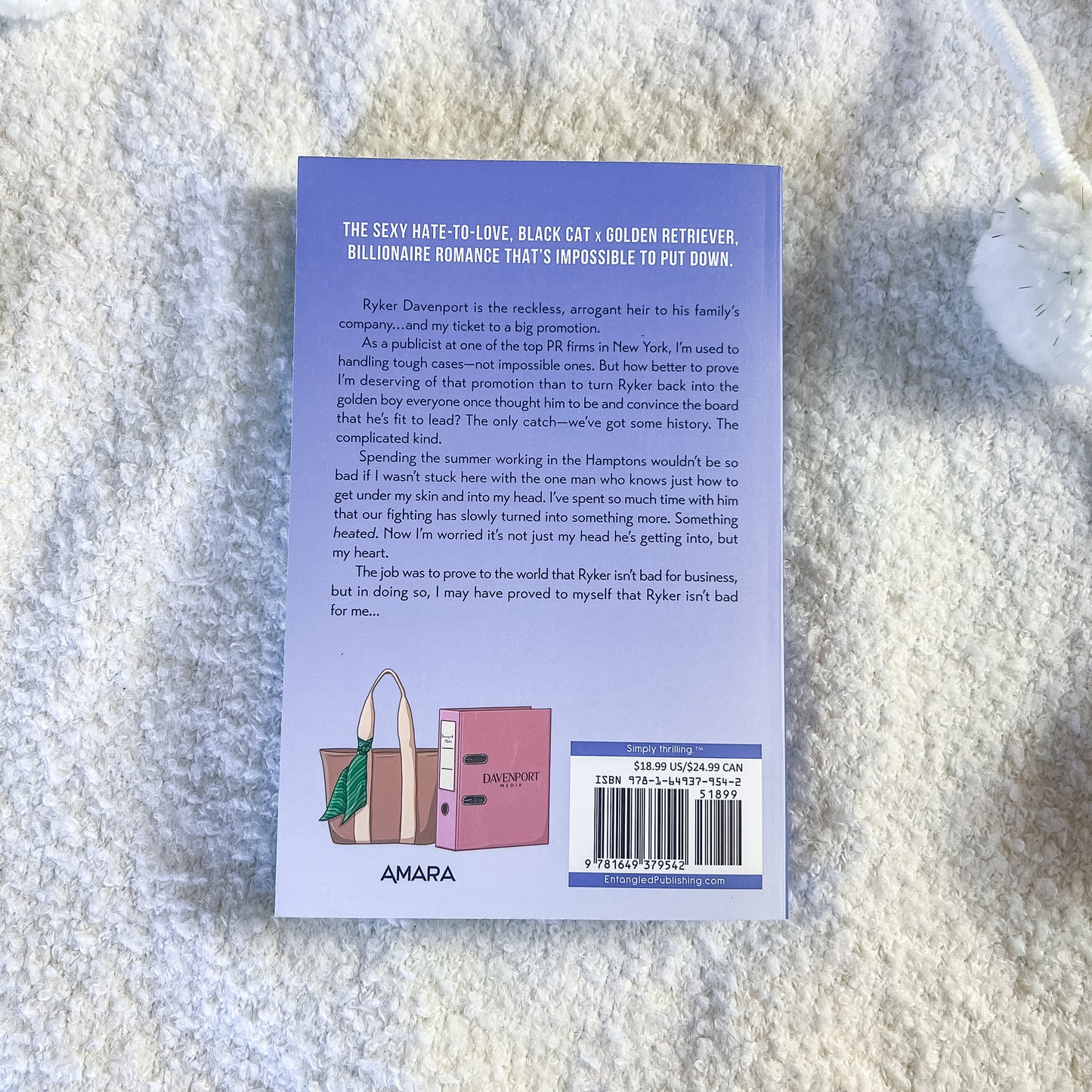 Back cover of a book with text and a barcode on a textured surface