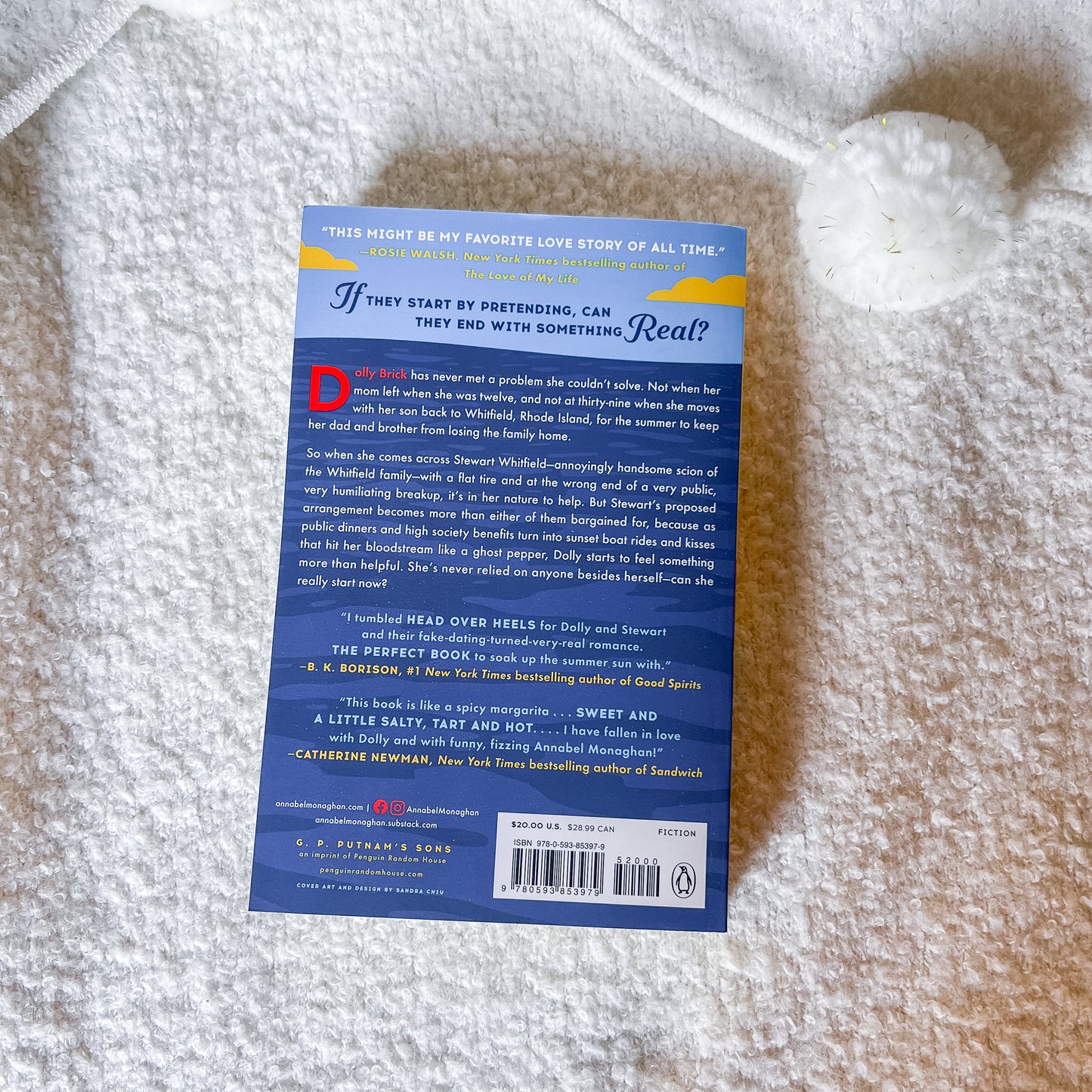 Book with a blue cover on a textured surface