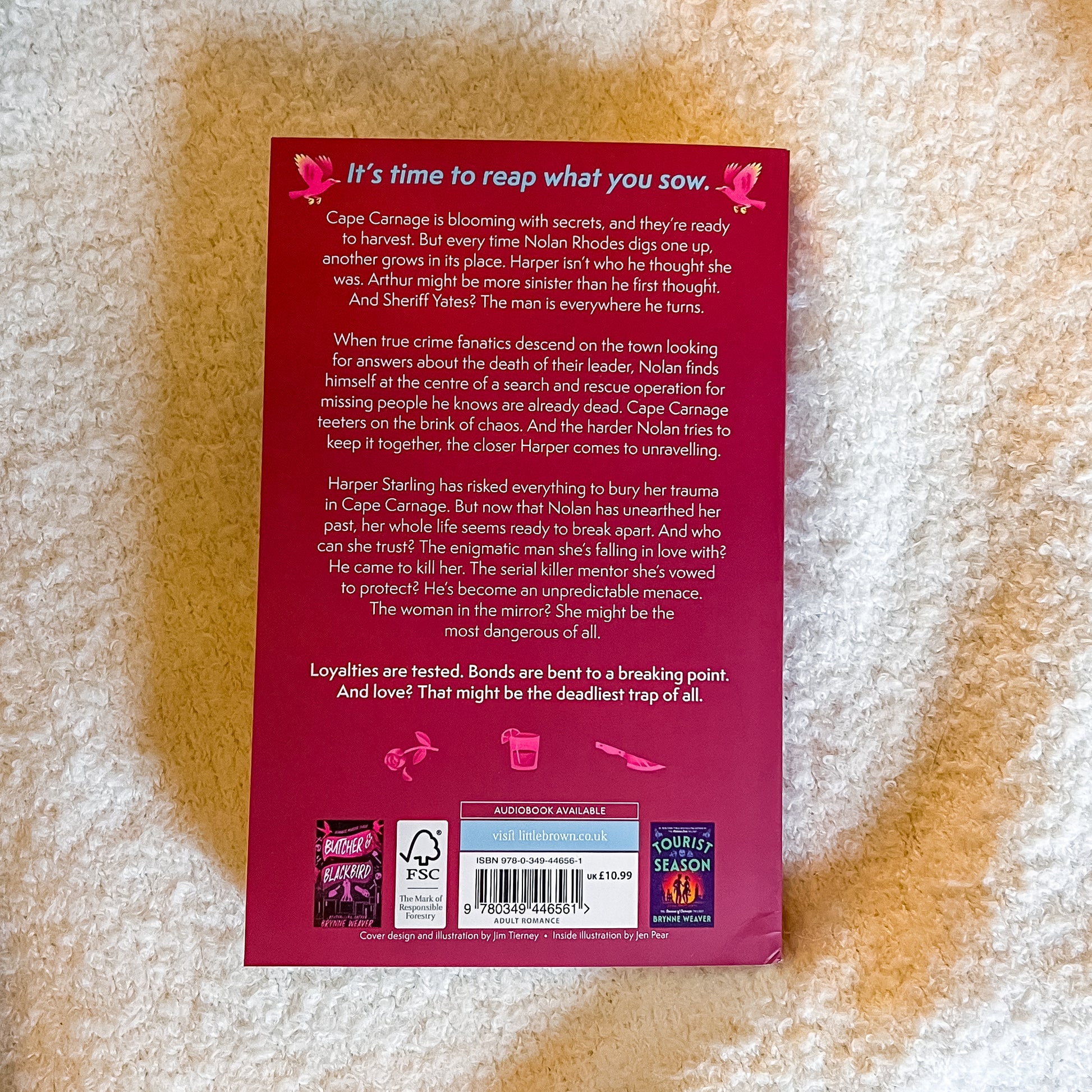Book back cover with text and barcodes on a textured surface