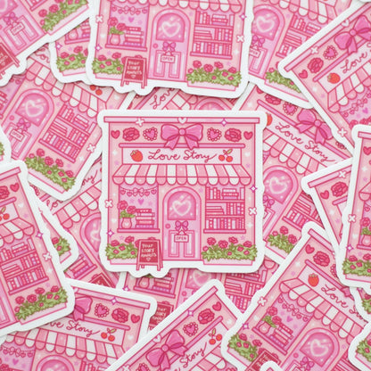 Pink 'Love Story' building stickers on a pink background