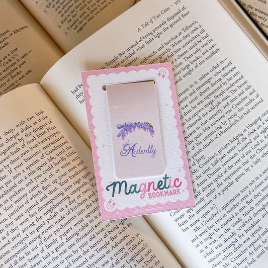 Magnetic bookmark with floral design on an open book