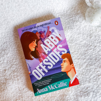 Book titled 'Abby Offsides' by Anna McCallie on a textured surface