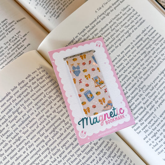 Magnetic bookmark with colorful design on an open book