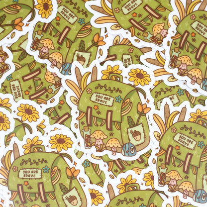 Pattern of green backpacks with cartoon characters and flowers on a white background