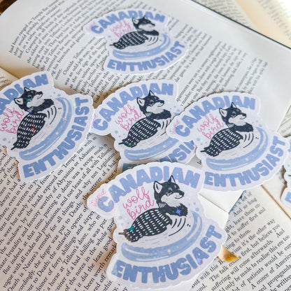 Stickers with 'Canadian Enthusiast' design on a book page