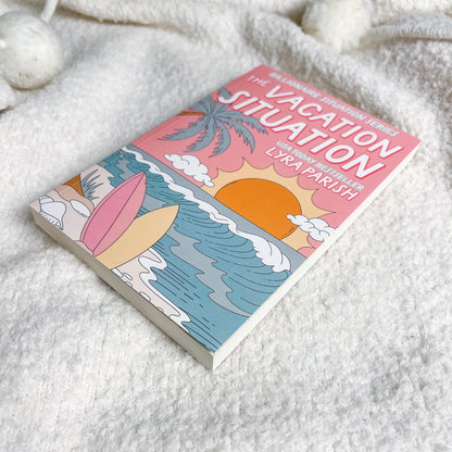 Book titled 'The Vacation Situation' by Lyra Parish on a textured surface