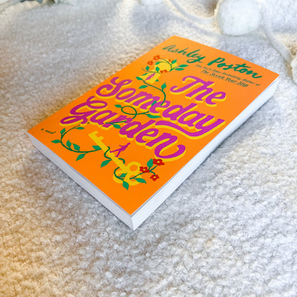 Book titled 'The Someday Garden' by Ashley Paxton on a textured surface