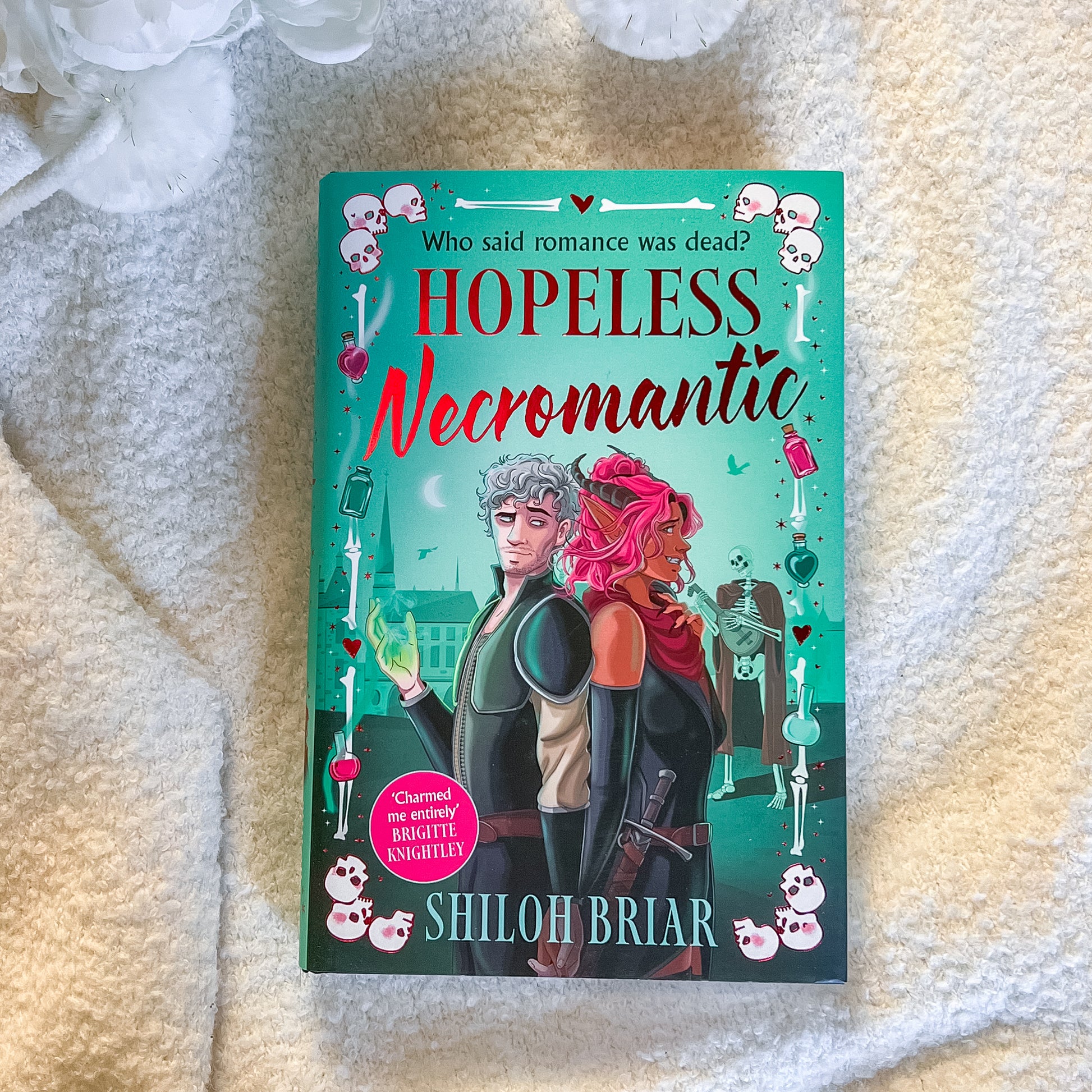 Book titled 'Hopeless Necromantic' by Shiloh Briar on a textured surface
