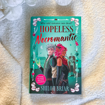 Book titled 'Hopeless Necromantic' by Shiloh Briar on a textured surface
