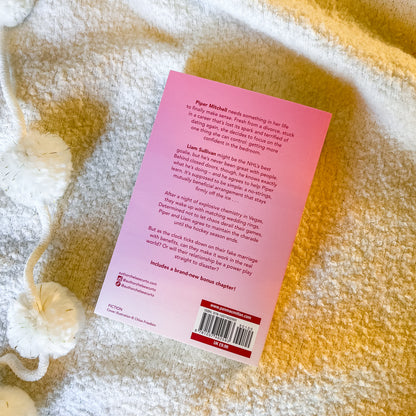 Book back cover with text and barcode on a textured surface