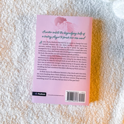 The back of 'Lucky Shot' by Rebecca Jenshak on a textured background.