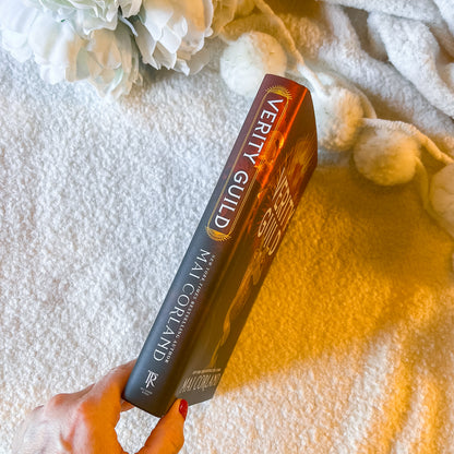 Book cover of 'Verity Guild' by Mai Corland with a fantasy design.