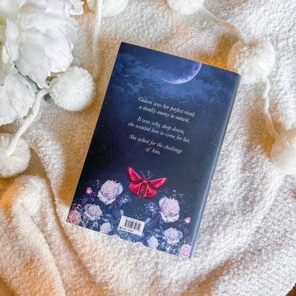 Book with a floral design on a textured surface