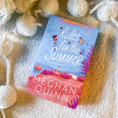 The book "rules for the summer" on a textured white background.
