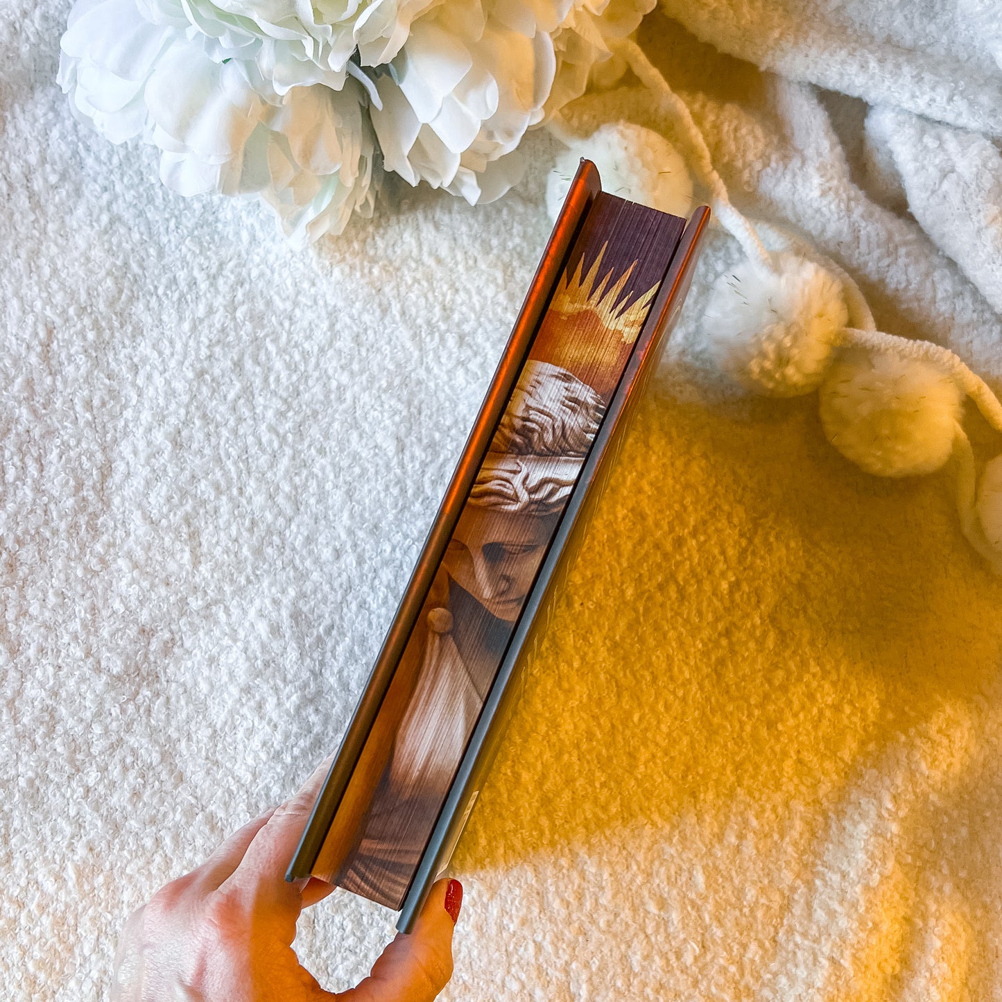 The sprayed edge design of 'Verity Guild' by Mai Corland with a fantasy design.