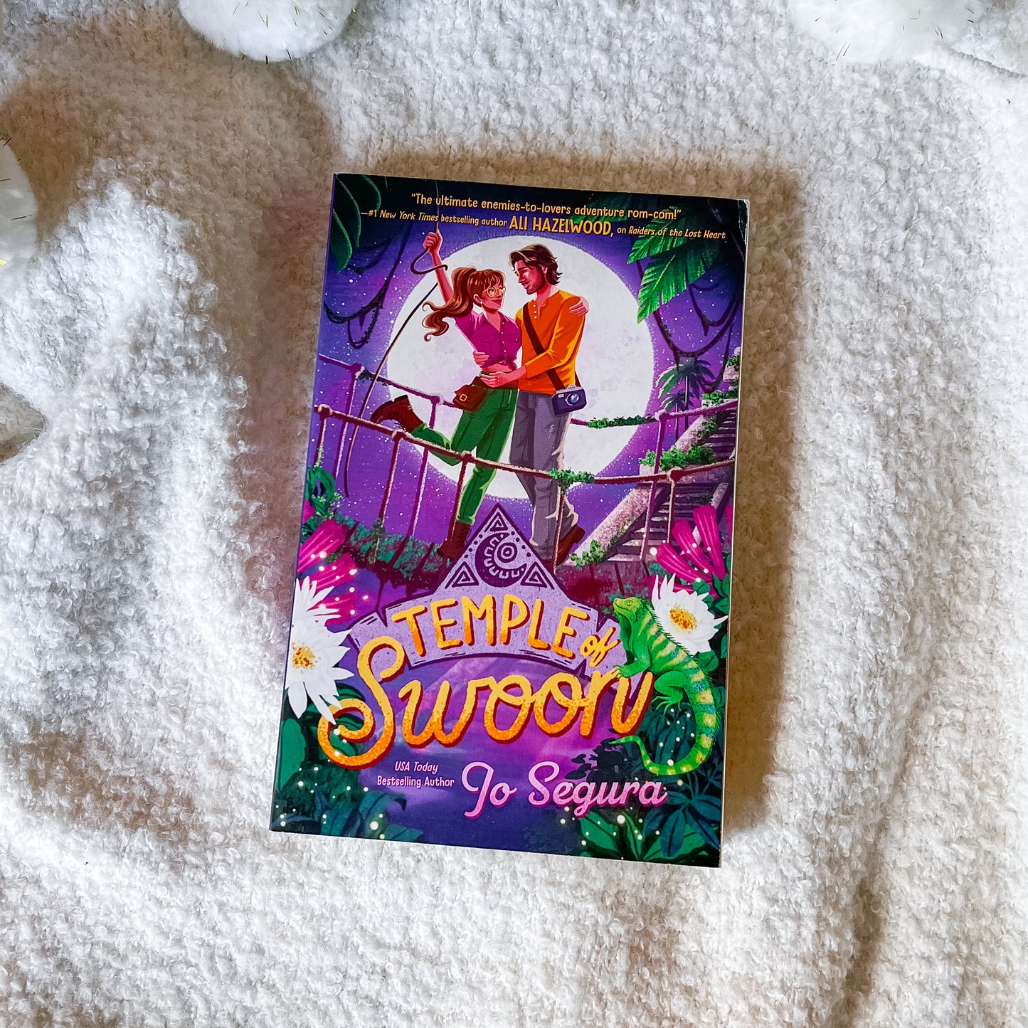 Book titled 'Temple of Swoon' by Jo Segura on a textured surface