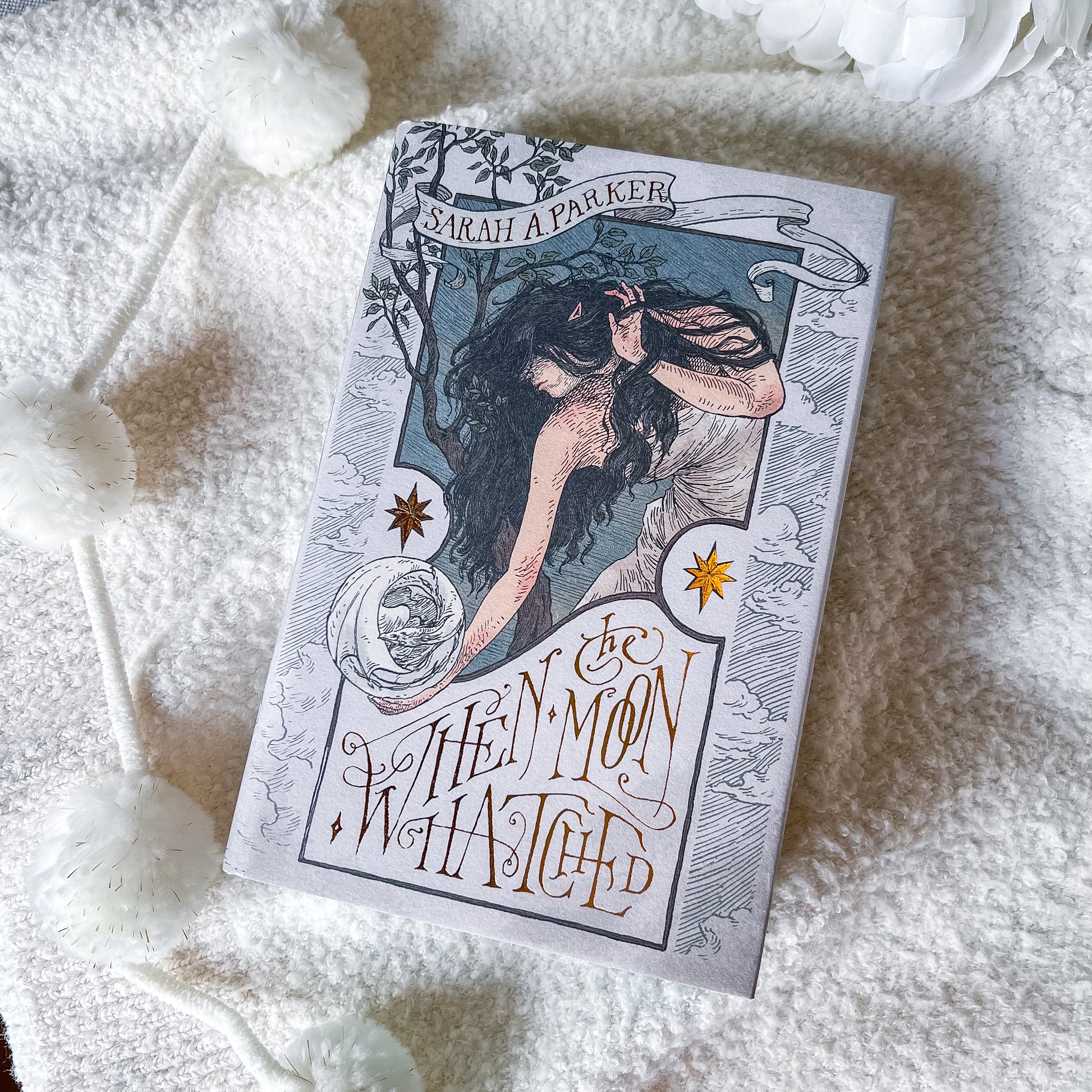 Book titled 'When Moon Hatched' by Sarah A. Parker on a textured white surface.