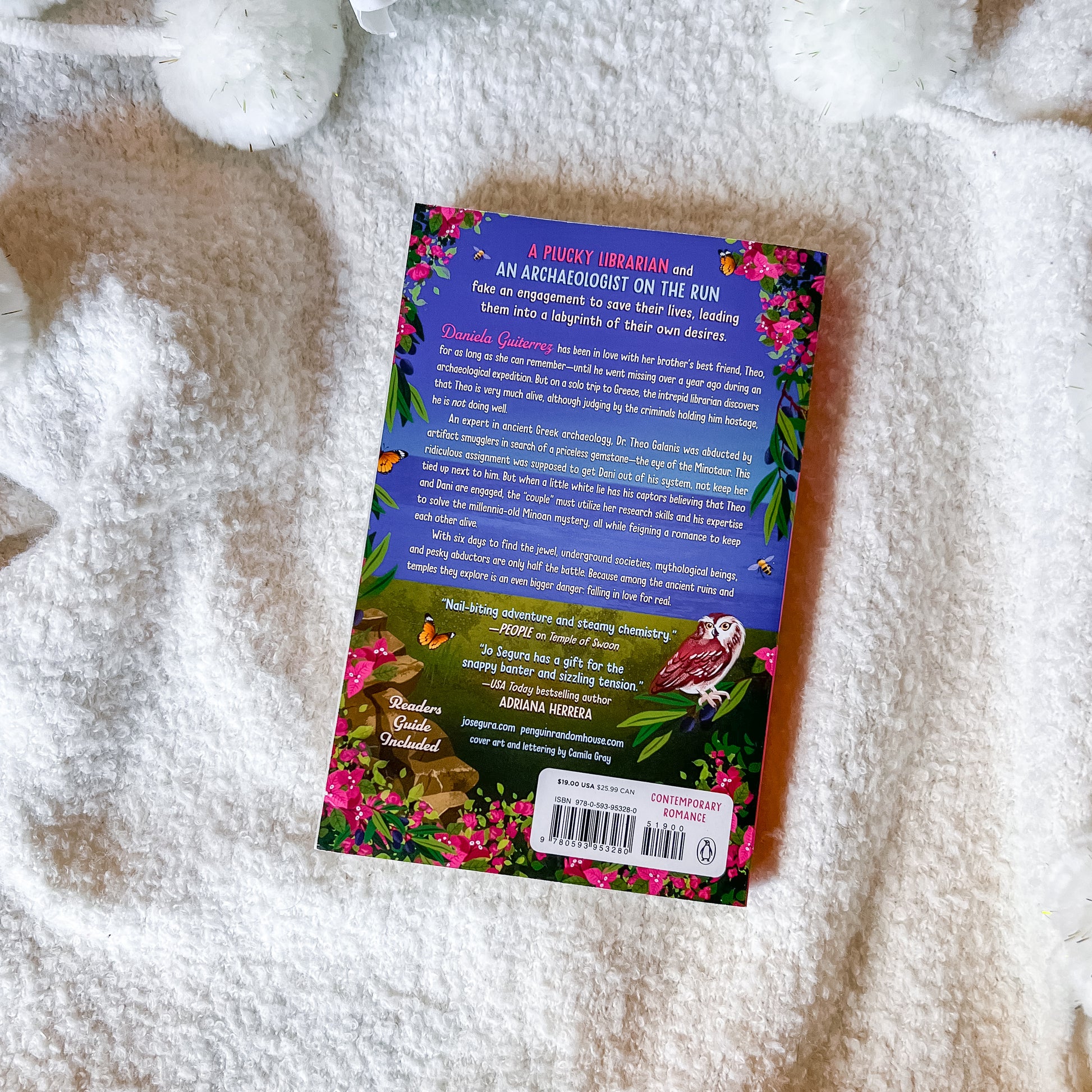 Book cover with colorful design on a textured surface