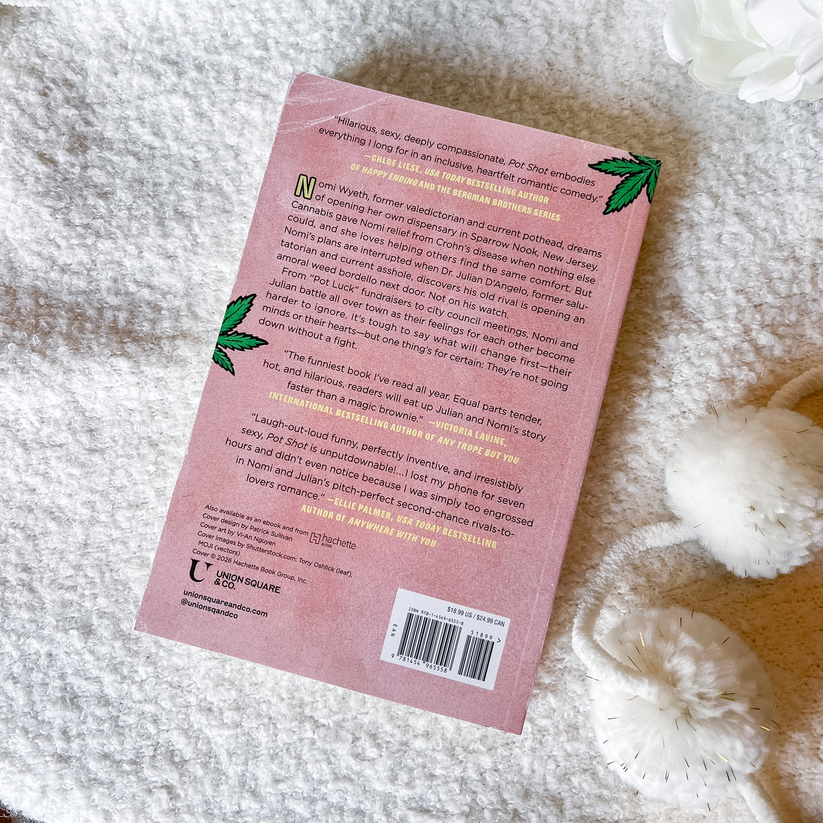 The back cover of a pink book 