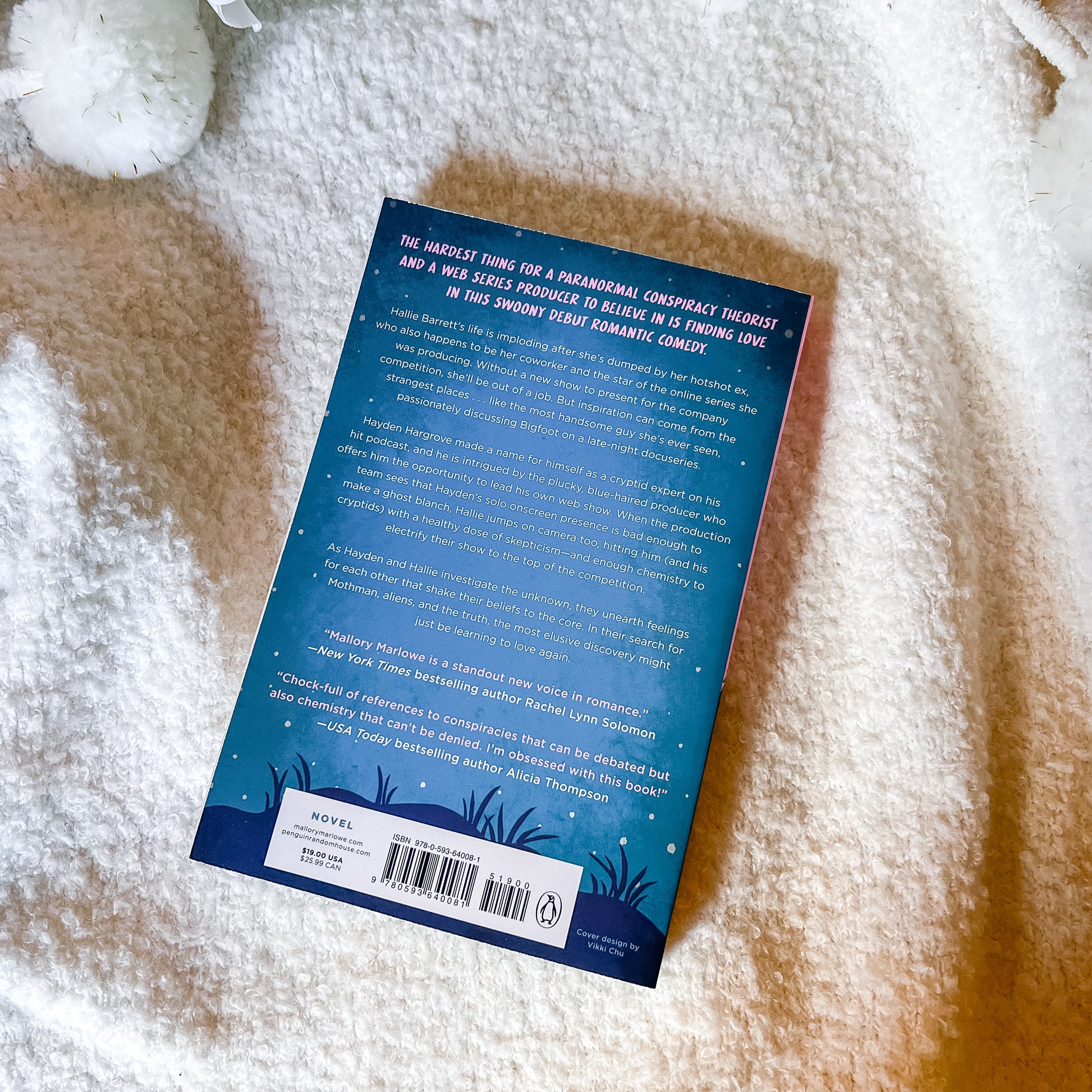 Book with blue cover on a textured surface
