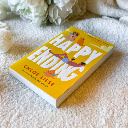 Happy Ending book by Chloe Liese on a light textured background