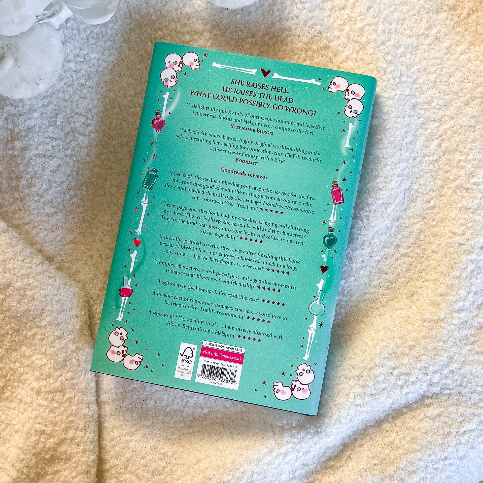 Book cover with text and illustrations on a textured surface