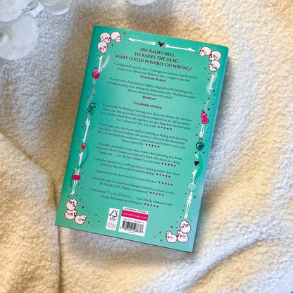 Book cover with text and illustrations on a textured surface