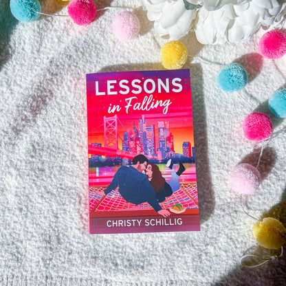 Book cover of 'Lessons in Falling' by Christy Schillig with a romantic illustration on a white background.