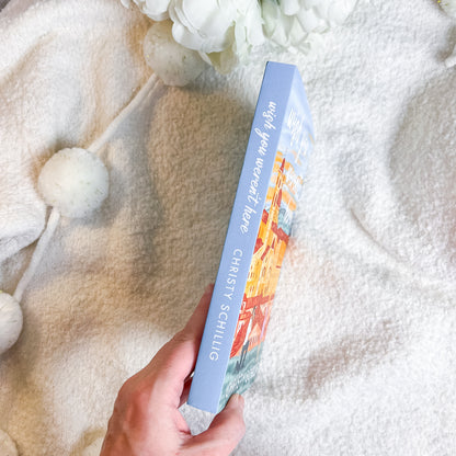 Book titled 'My Very Own World' by Christy Schillig held against a soft, textured background.