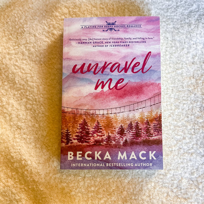 Book cover of 'Unravel Me' by Becka Mack on a textured surface