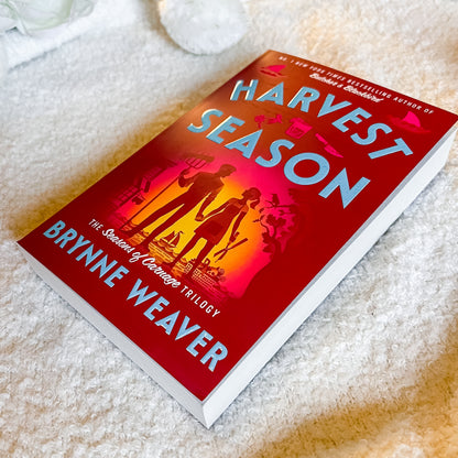 Book titled 'Harvest Season' by Brynne Weaver on a textured surface
