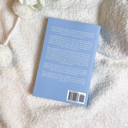 Book back cover with text on a textured white surface