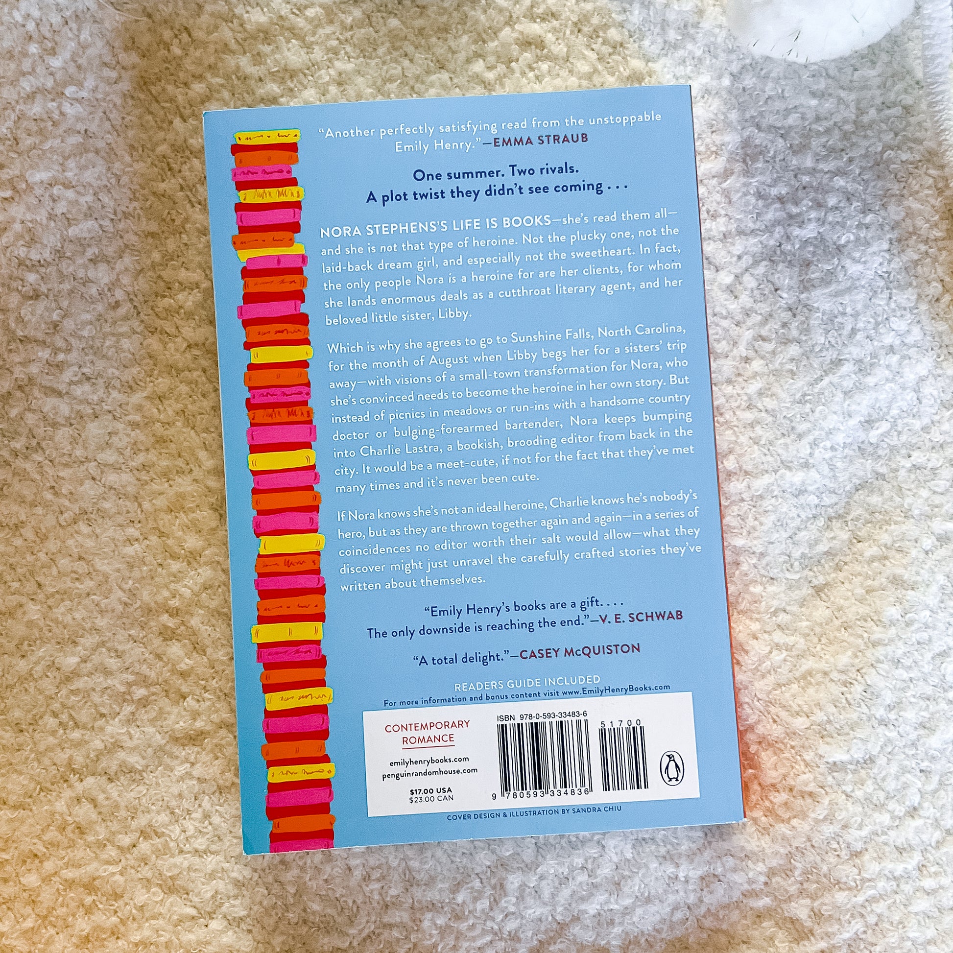 Book back cover with colorful design on a textured surface