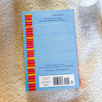 Book back cover with colorful design on a textured surface